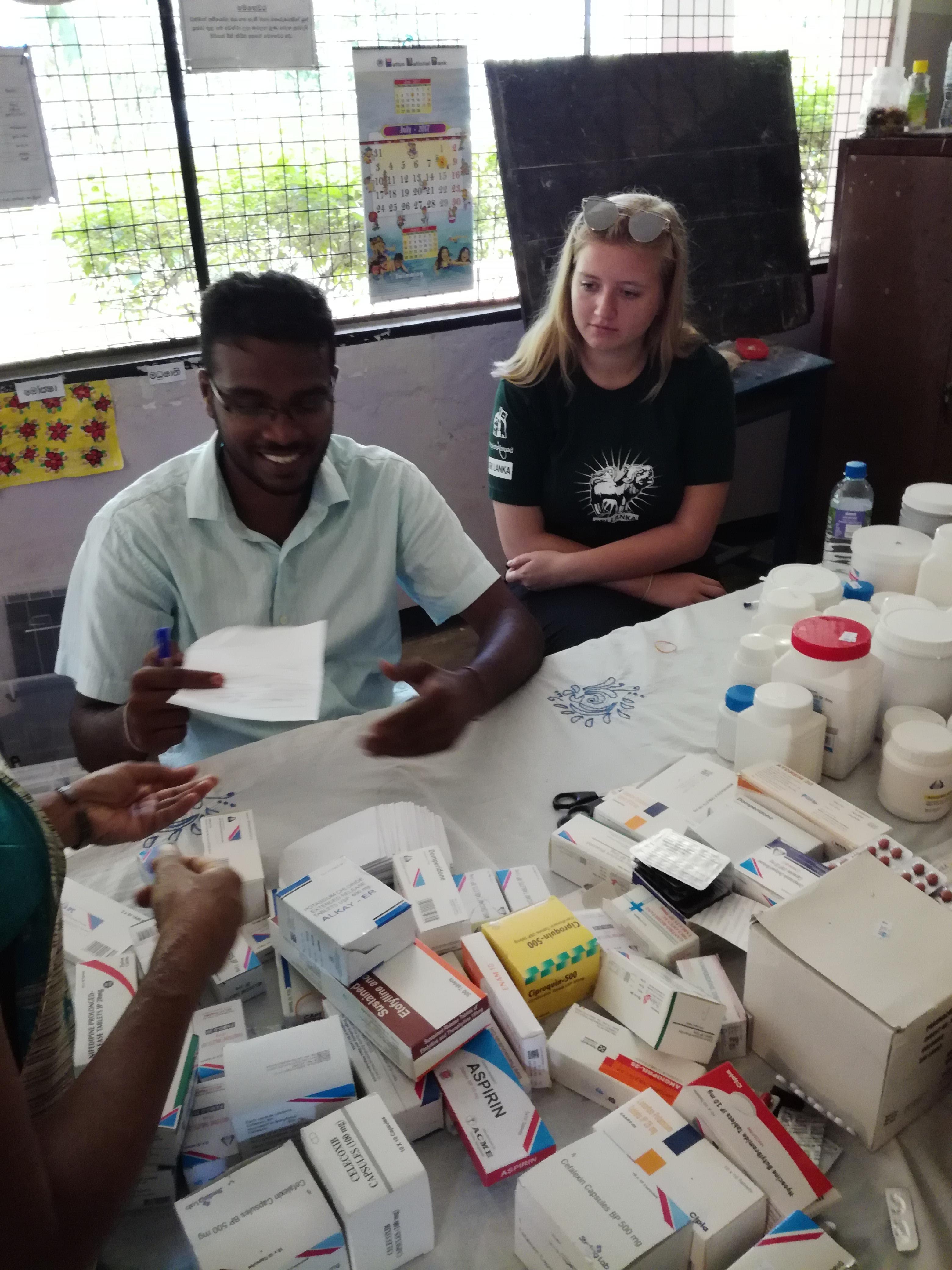 Projects Abroad interns assisting doctors with medicine prescriptions as part of their pharmacy internship in Sri Lanka. Interns from Projects Abroad helping doctors with medicine prescriptions as part of their pharmacy internship in Sri Lanka.